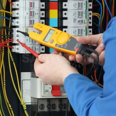 Electrician repairing electrical board in new jersey