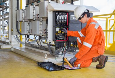 Electrician repairing electrical Generator Luminous llc