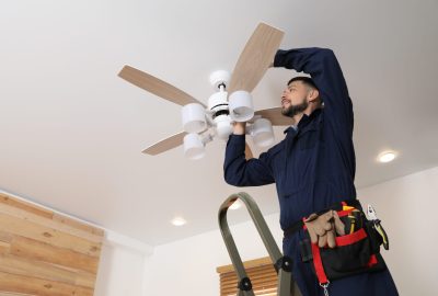 Electrician repairing electrical fan in new jersey