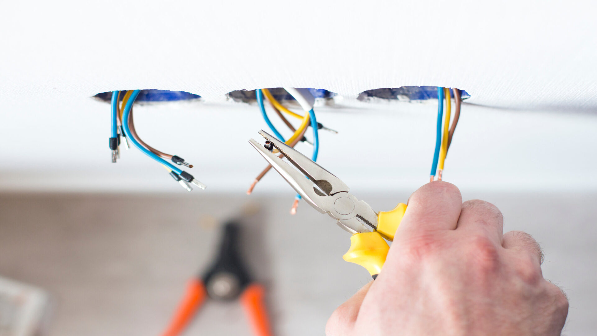 Electrician working project board Luminous llc